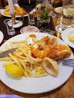 Scampi Und Tintenfisch Mit Pommes U Salat